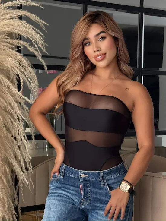 Body Eclipse negro con jean look casual elegante